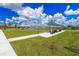 Well-maintained bocce ball courts with covered seating at 7249 W Lenox Cir, Punta Gorda, FL 33950