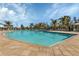 Community pool with surrounding patio and seating at 7249 W Lenox Cir, Punta Gorda, FL 33950