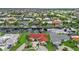 Aerial view of a waterfront home with red tile roof and boat dock at 820 Bal Harbor Blvd, Punta Gorda, FL 33950