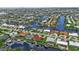 Aerial view of canal front property and surrounding homes at 820 Bal Harbor Blvd, Punta Gorda, FL 33950