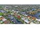 Aerial view of canal-front homes and neighborhood at 820 Bal Harbor Blvd, Punta Gorda, FL 33950