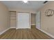 Spacious bedroom with double doors leading to closet and additional room at 820 Bal Harbor Blvd, Punta Gorda, FL 33950