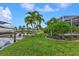 Beautiful canal-front property with lush landscaping at 820 Bal Harbor Blvd, Punta Gorda, FL 33950