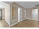 Bright hallway with neutral walls and laminate flooring at 820 Bal Harbor Blvd, Punta Gorda, FL 33950