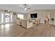 Spacious living room with vaulted ceilings and a large TV at 820 Bal Harbor Blvd, Punta Gorda, FL 33950