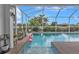 Pool area with ladder access and flamingo floats at 820 Bal Harbor Blvd, Punta Gorda, FL 33950