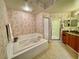 Spa-like bathroom with soaking tub and walk-in shower at 93 Vivante Blvd # 9325, Punta Gorda, FL 33950