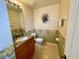 Small bathroom with granite countertop, toilet and shower/tub combo at 93 Vivante Blvd # 9325, Punta Gorda, FL 33950