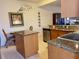 Eat-in kitchen with island and breakfast bar at 93 Vivante Blvd # 9325, Punta Gorda, FL 33950