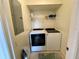 Laundry room with washer and dryer included at 93 Vivante Blvd # 9325, Punta Gorda, FL 33950