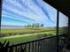 Stunning view of the water from screened balcony at 93 Vivante Blvd # 9325, Punta Gorda, FL 33950