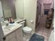 Clean bathroom with shower, toilet and vanity at 25332 Vantage Ln, Punta Gorda, FL 33983