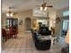 Living room with comfortable seating and a view into the kitchen at 25332 Vantage Ln, Punta Gorda, FL 33983