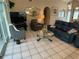 Living area with comfortable seating and a view into the dining area at 25332 Vantage Ln, Punta Gorda, FL 33983