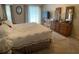 Spacious main bedroom with a king-size bed and walk-in closet at 25332 Vantage Ln, Punta Gorda, FL 33983