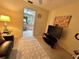 Cozy Gathering room with a TV and access to the bathroom at 1022 Campbell St, Port Charlotte, FL 33953