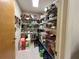 Well-stocked pantry with ample shelving for storage at 1022 Campbell St, Port Charlotte, FL 33953