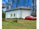 Detached workshop with a large overhead door at 1022 Campbell St, Port Charlotte, FL 33953