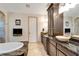 Elegant bathroom with double vanity and granite at 1041 Harbour Park Ct, Punta Gorda, FL 33983