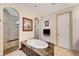 Luxurious bathroom with soaking tub and walk-in shower at 1041 Harbour Park Ct, Punta Gorda, FL 33983