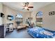 Bright bedroom with large windows and playful decor at 1041 Harbour Park Ct, Punta Gorda, FL 33983