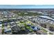 Aerial showing home's location in a residential waterfront community at 1099 Cimarron Dr, Punta Gorda, FL 33950