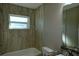 Clean bathroom with tile flooring and a bathtub at 1101 Victoria Ave, Port Charlotte, FL 33948