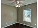 Bright bedroom with ceiling fan and large window at 1101 Victoria Ave, Port Charlotte, FL 33948