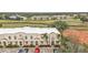 Aerial view of townhome building with parking at 1246 Rio De Janeiro Ave # 509, Punta Gorda, FL 33983