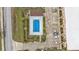 Community pool with lounge chairs at 1246 Rio De Janeiro Ave # 509, Punta Gorda, FL 33983