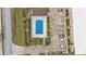 Community pool with lounge chairs at 1246 Rio De Janeiro Ave # 509, Punta Gorda, FL 33983