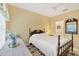 Guest bedroom with a double bed and ensuite bathroom at 1259 Red Oak Ln, Port Charlotte, FL 33948