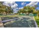 Community bocce ball court under shady trees at 1259 Red Oak Ln, Port Charlotte, FL 33948