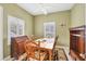 Charming dining room with wooden table and chairs at 1259 Red Oak Ln, Port Charlotte, FL 33948