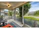 Spacious screened porch with outdoor furniture at 1259 Red Oak Ln, Port Charlotte, FL 33948