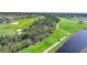 Aerial view of the golf course and surrounding community at 14033 Black Beauty Dr # 511, Punta Gorda, FL 33955