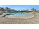 Resort-style pool with a sandy beach entry at 14033 Black Beauty Dr # 511, Punta Gorda, FL 33955