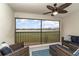 Relaxing lanai space with comfortable seating and serene lake views at 15950 Grassland Ln # 2622, Punta Gorda, FL 33982