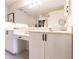 Elegant bathroom with double vanity and large mirror at 164 Baldwin Se Ct, Port Charlotte, FL 33952