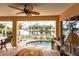 Relaxing lanai with canal views and seating at 164 Baldwin Se Ct, Port Charlotte, FL 33952