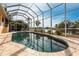 Relaxing screened pool with canal views at 164 Baldwin Se Ct, Port Charlotte, FL 33952