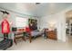 Cozy bedroom with a twin bed, desk, and Everlast punching bag at 168 Dartmouth Nw Dr, Port Charlotte, FL 33952