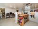 Bright kitchen features wood cabinets, butcher block countertops, and a vintage stove at 168 Dartmouth Nw Dr, Port Charlotte, FL 33952