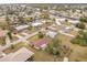 Aerial view of neighborhood showing canal and nearby houses at 168 Dartmouth Nw Dr, Port Charlotte, FL 33952