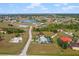 Aerial view of home and neighborhood; highlighting lot size and location at 17654 Vellum Cir, Punta Gorda, FL 33955