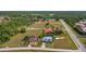 Aerial view of property, showcasing home and surrounding landscape at 17654 Vellum Cir, Punta Gorda, FL 33955