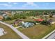 Aerial view of home and surrounding landscape at 17654 Vellum Cir, Punta Gorda, FL 33955