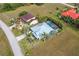 Aerial view of property highlighting the home and pool at 17654 Vellum Cir, Punta Gorda, FL 33955