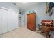 Bedroom with closet and rocking chair at 17654 Vellum Cir, Punta Gorda, FL 33955