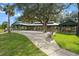 Large covered pavilion with many picnic tables at 17654 Vellum Cir, Punta Gorda, FL 33955